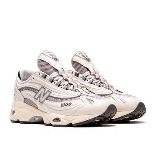 Tenis Hombre New Balance 1000 Blanco Gris vista lateral par
